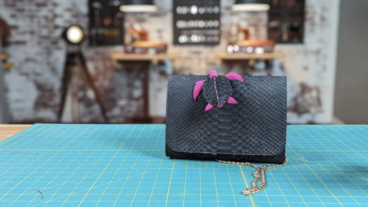 Design a luxury python handbag with confidence