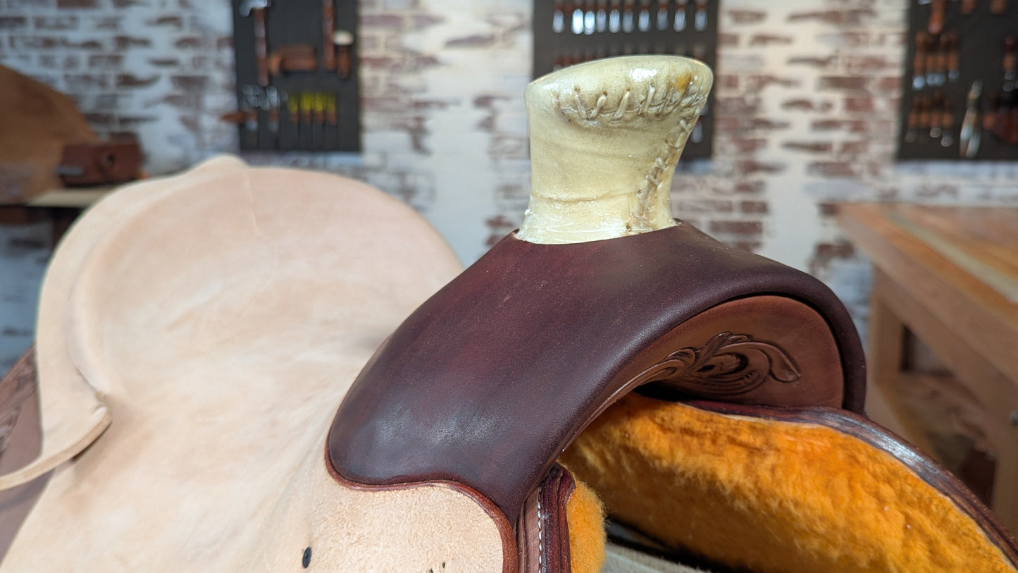 Close-up of a saddle swell  in a workshop setting.